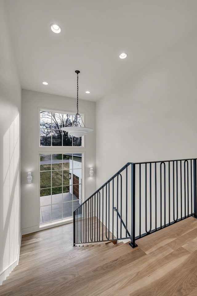 128 Alton Rd, Nashville, TN 37205 - staircase featuring wood finished floors, a fireplace, baseboards, and recessed lighting
