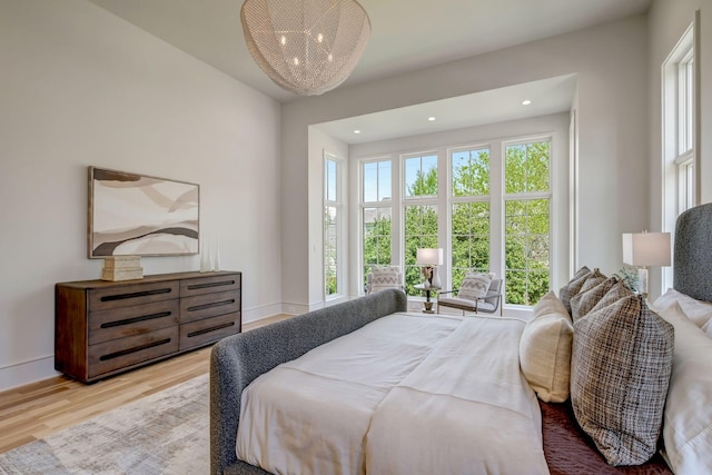 128 Alton Rd, Nashville, TN 37205 - bedroom featuring wood finished floors, a notable chandelier, baseboards, and recessed lighting