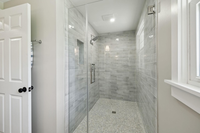 bathroom with a stall shower