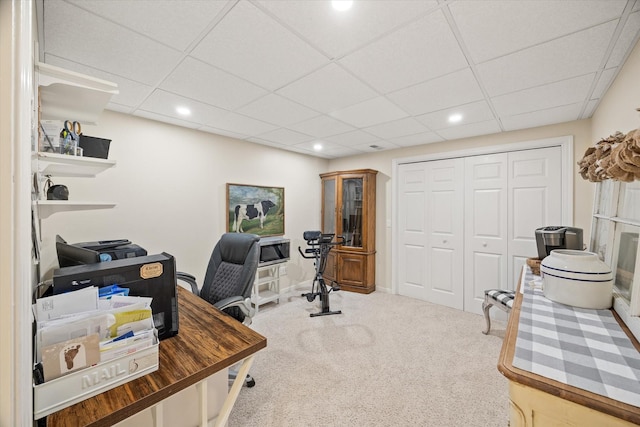 carpeted office featuring recessed lighting and a paneled ceiling
