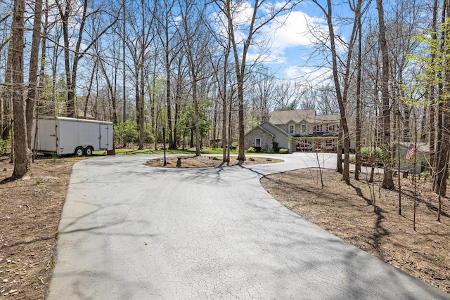 view of road featuring driveway