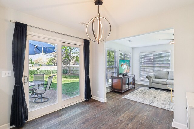 245 Wisteria Dr, Franklin, TN 37064 - doorway to outside featuring dark wood-style floors, baseboards, visible vents, and a healthy amount of sunlight