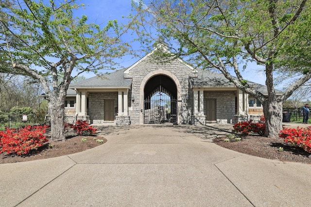 245 Wisteria Dr, Franklin, TN 37064 - view of front facade with roof with shingles and stone siding