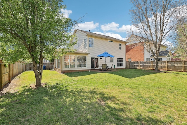 245 Wisteria Dr, Franklin, TN 37064 - back of house with a fenced backyard and a lawn