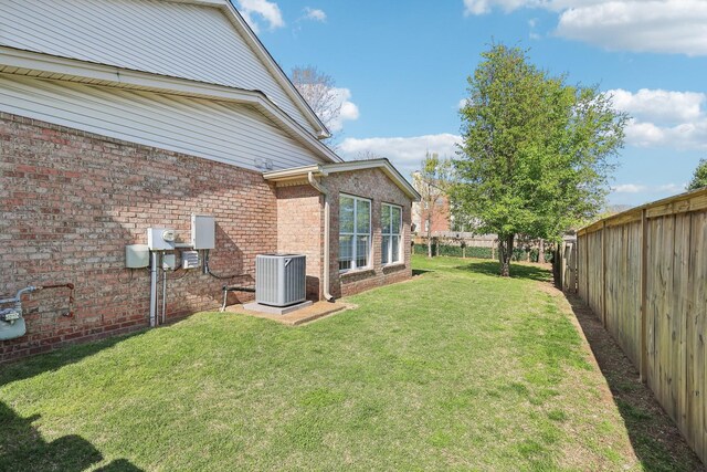 245 Wisteria Dr, Franklin, TN 37064 - view of yard with central air condition unit and a fenced backyard