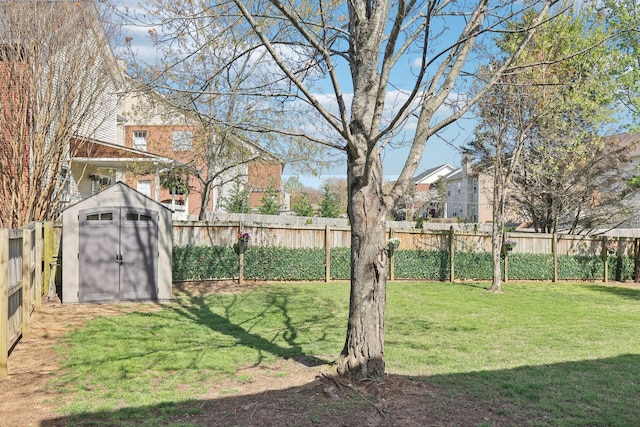 245 Wisteria Dr, Franklin, TN 37064 - view of yard featuring an outbuilding, a fenced backyard, and a shed
