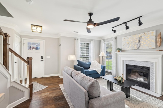 245 Wisteria Dr, Franklin, TN 37064 - living room featuring visible vents, ornamental molding, a ceiling fan, stairway, and wood finished floors
