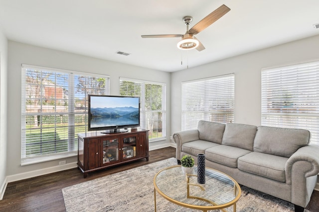 245 Wisteria Dr, Franklin, TN 37064 - living area with dark wood-style flooring, visible vents, baseboards, and ceiling fan