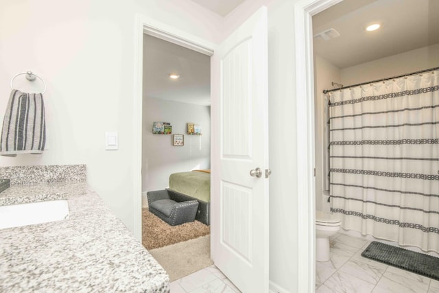 bathroom featuring visible vents, toilet, recessed lighting, vanity, and marble finish floor