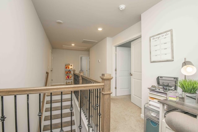 carpeted office space with attic access and recessed lighting