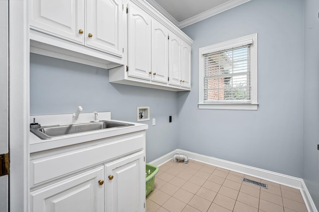 laundry area with visible vents, baseboards, ornamental molding, cabinet space, and hookup for a washing machine