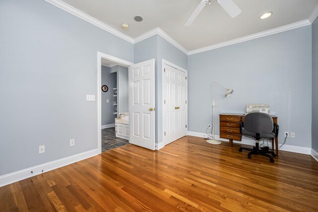 home office featuring baseboards, crown molding, a ceiling fan, and wood finished floors