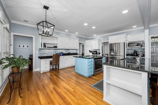 kitchen with white cabinetry, a kitchen island, open shelves, and stainless steel appliances