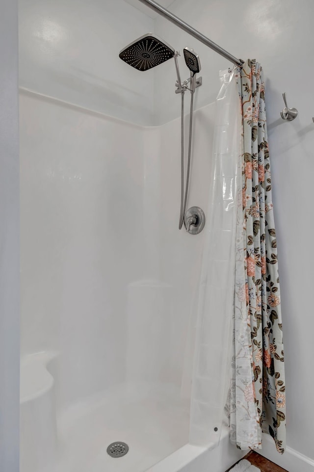 bathroom with a stall shower