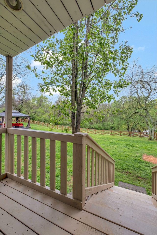 deck featuring a yard