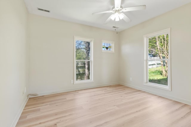 201 Knob Creek Rd, Wartrace, TN 37183 - empty room with visible vents, light wood-type flooring, ceiling fan, and baseboards