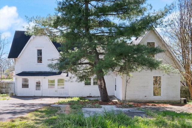 201 Knob Creek Rd, Wartrace, TN 37183 - view of front facade featuring central AC, fence, and board and batten siding