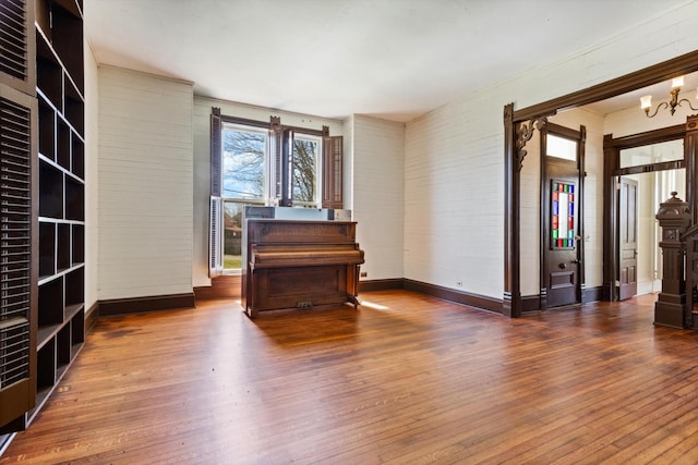 201 Knob Creek Rd, Wartrace, TN 37183 - sitting room featuring wood-type flooring, a notable chandelier, and baseboards