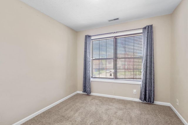 1995 General Neyland Dr, Clarksville, TN 37042 - spare room featuring visible vents, baseboards, and carpet flooring