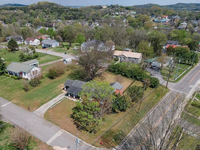 birds eye view of property with a residential view