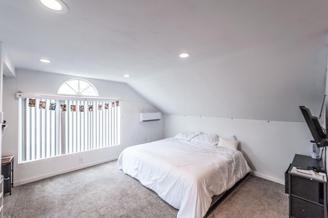 bedroom featuring baseboards, vaulted ceiling, a wall mounted air conditioner, recessed lighting, and carpet