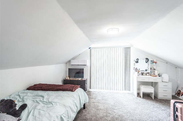 carpeted bedroom featuring a wall mounted air conditioner and lofted ceiling
