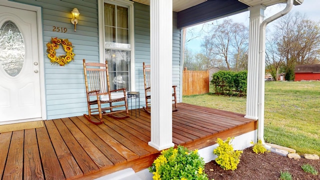 2519 Old Greenbrier Pike, Greenbrier, TN 37073 - wooden terrace featuring a lawn and covered porch