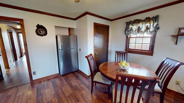 2519 Old Greenbrier Pike, Greenbrier, TN 37073 - dining space featuring crown molding, baseboards, and wood finished floors