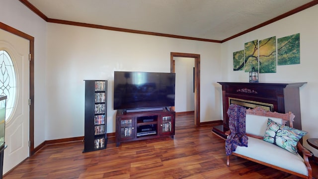 2519 Old Greenbrier Pike, Greenbrier, TN 37073 - living area with crown molding, baseboards, and wood finished floors
