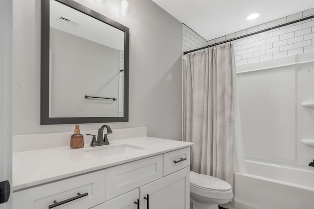 full bathroom featuring vanity, recessed lighting, toilet, shower / bathtub combination with curtain, and visible vents