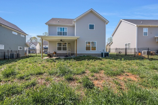 back of property with a patio area, a fenced backyard, cooling unit, and ceiling fan