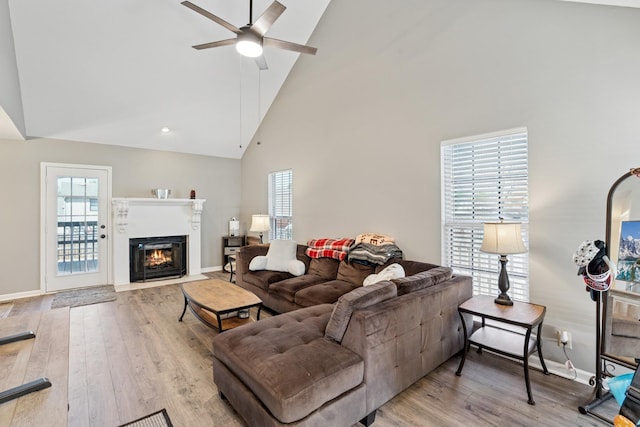 238 Kathleen Ct, Clarksville, TN 37043 - living area with baseboards, high vaulted ceiling, wood finished floors, and a ceiling fan