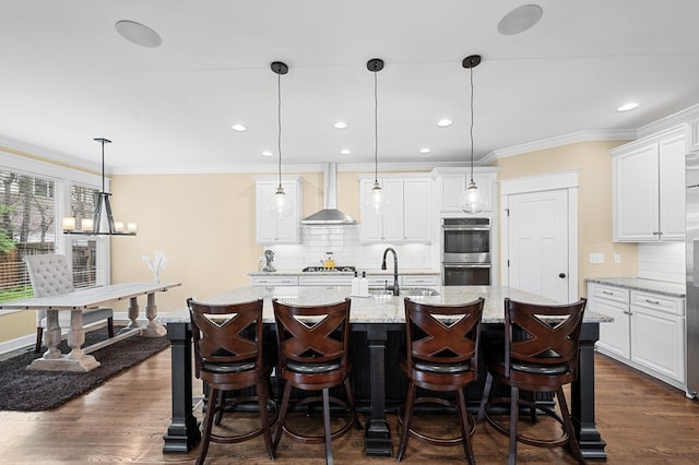15 Westlawn Ct, Nashville, TN 37209 - kitchen featuring wall chimney range hood, backsplash, crown molding, double oven, and a sink