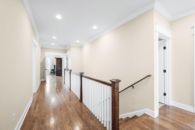 15 Westlawn Ct, Nashville, TN 37209 - hall featuring ornamental molding, baseboards, an upstairs landing, and wood finished floors