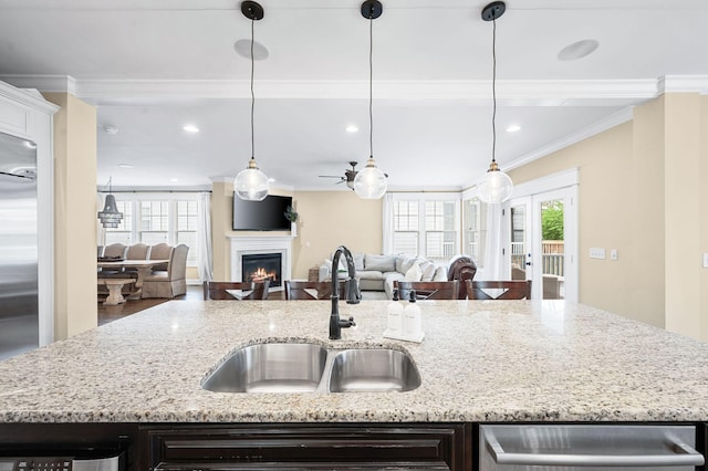 15 Westlawn Ct, Nashville, TN 37209 - kitchen with a warm lit fireplace, recessed lighting, a sink, open floor plan, and french doors