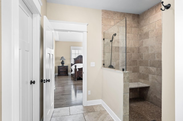 15 Westlawn Ct, Nashville, TN 37209 - full bathroom with walk in shower, ensuite bath, and baseboards