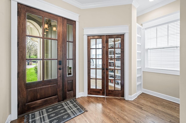 15 Westlawn Ct, Nashville, TN 37209 - doorway featuring baseboards, a healthy amount of sunlight, crown molding, wood finished floors, and french doors