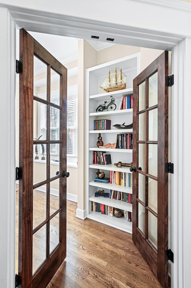 15 Westlawn Ct, Nashville, TN 37209 - doorway with french doors, wood finished floors, and baseboards
