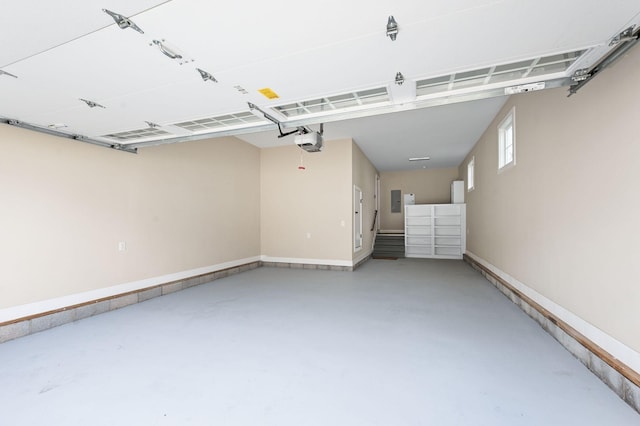 15 Westlawn Ct, Nashville, TN 37209 - garage with baseboards and a garage door opener