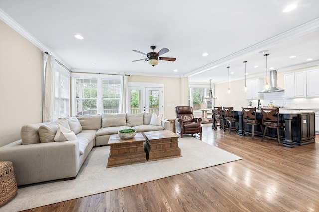 15 Westlawn Ct, Nashville, TN 37209 - living room featuring ornamental molding, recessed lighting, french doors, a ceiling fan, and wood finished floors