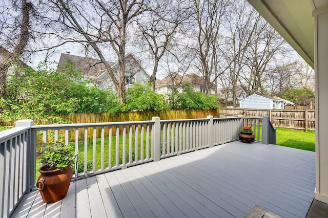 15 Westlawn Ct, Nashville, TN 37209 - wooden deck with a fenced backyard and a lawn