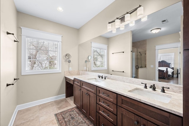15 Westlawn Ct, Nashville, TN 37209 - ensuite bathroom with a shower stall, visible vents, a sink, and baseboards