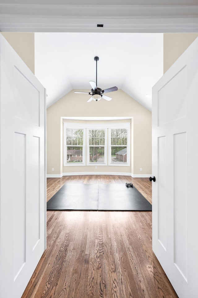15 Westlawn Ct, Nashville, TN 37209 - unfurnished living room with wood finished floors, baseboards, a ceiling fan, and lofted ceiling