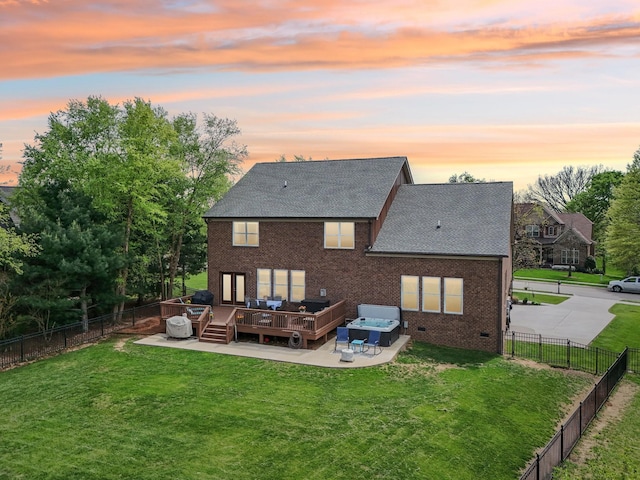 1702 Stoney Hill Ln, Spring Hill, TN 37174 - rear view of house featuring a patio, a fenced backyard, brick siding, and a deck