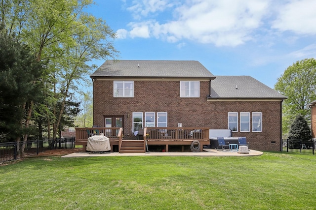 1702 Stoney Hill Ln, Spring Hill, TN 37174 - back of property with a fenced backyard, a wooden deck, brick siding, and a lawn