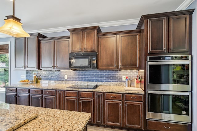 1702 Stoney Hill Ln, Spring Hill, TN 37174 - kitchen with crown molding, light stone counters, and black appliances