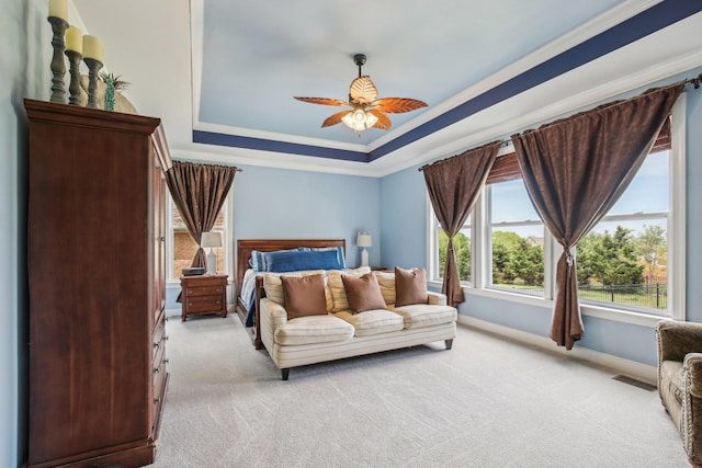 1702 Stoney Hill Ln, Spring Hill, TN 37174 - bedroom with baseboards, a tray ceiling, light colored carpet, and crown molding