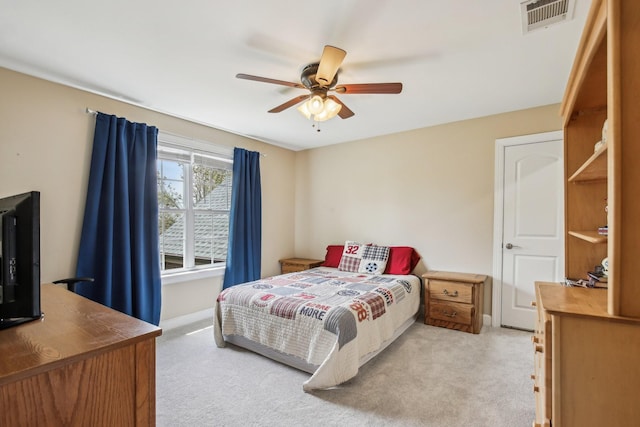 1702 Stoney Hill Ln, Spring Hill, TN 37174 - bedroom featuring light carpet, baseboards, visible vents, and a ceiling fan