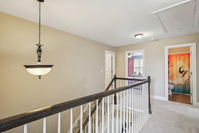 1702 Stoney Hill Ln, Spring Hill, TN 37174 - hall with attic access, light carpet, an upstairs landing, and baseboards