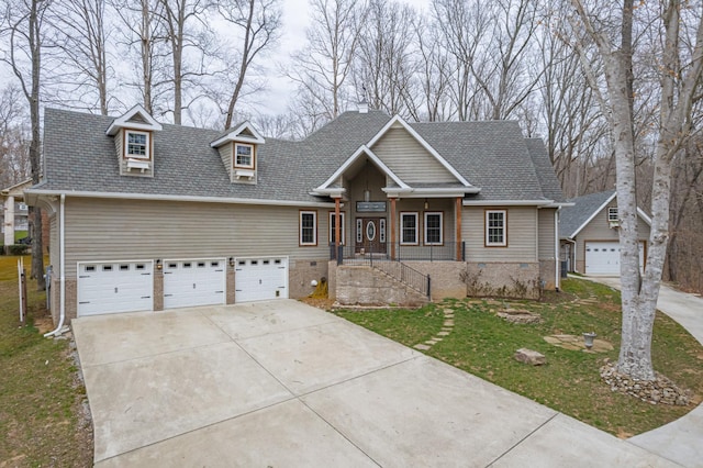 550 Laurel Crown Rd, Manchester, TN 37355 - view of front of house featuring concrete driveway, a front lawn, and an attached garage